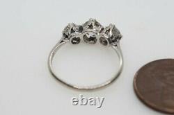 Elegant Antique English Platinum Old European Brilliant Cut Diamond Trilogy Ring