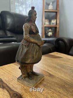 Vintage antique statue old lady