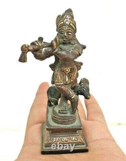 Figure / Statue en cuivre antique vintage du Seigneur Krishna avec finition en argent et laiton