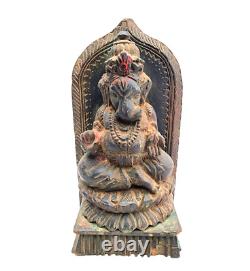 Statue en bois de rose ancienne, antique et vintage, sculptée à la main, représentant la divinité hindoue Ganesha.
